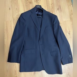 Navy Brooks Brothers suit. 38R jacket. 32x31 pants.